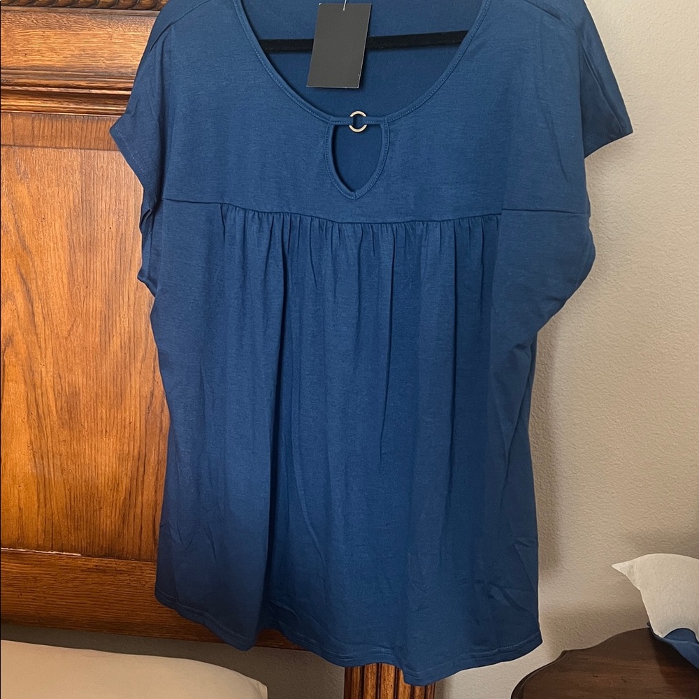 New blue babydoll shirt size 2X. Comfy sleeves . Ready for spring/summer.